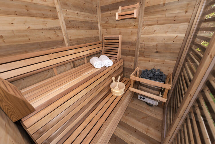 Red Cedar knotty interior pure cube sauna with two tier benches